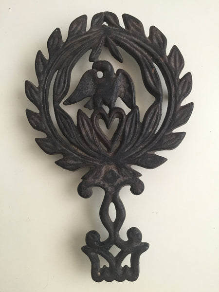 Vintage Black Cast Iron Trivet, pot holder, cookware holder, Eagle and heart design. Americana