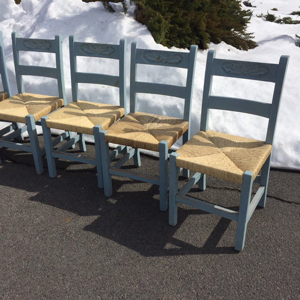 Set of 7 Vintage Folk Art Primitive Mexican Painted Carved Ladder Back Chairs rush seats. Original light blue distressed painted finish.