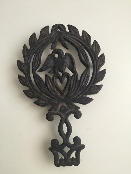 Vintage Black Cast Iron Trivet, pot holder, cookware holder, Eagle and heart design. Americana