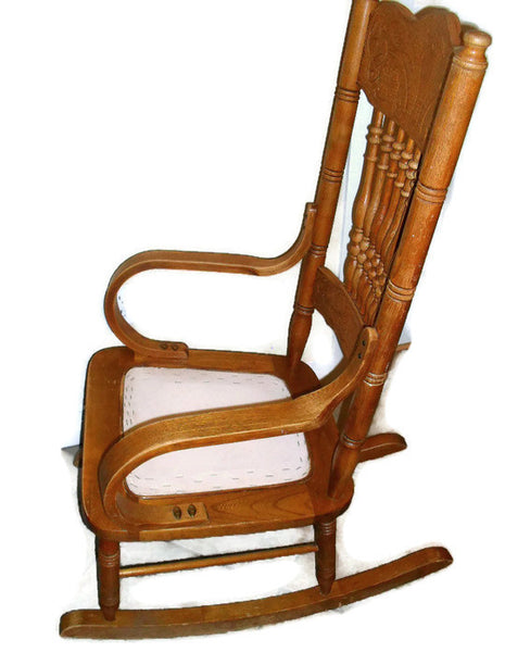 Early twentieth century press back oak wood rocking chair